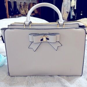 Elegant Cream Handbag with Gold Bee Accent